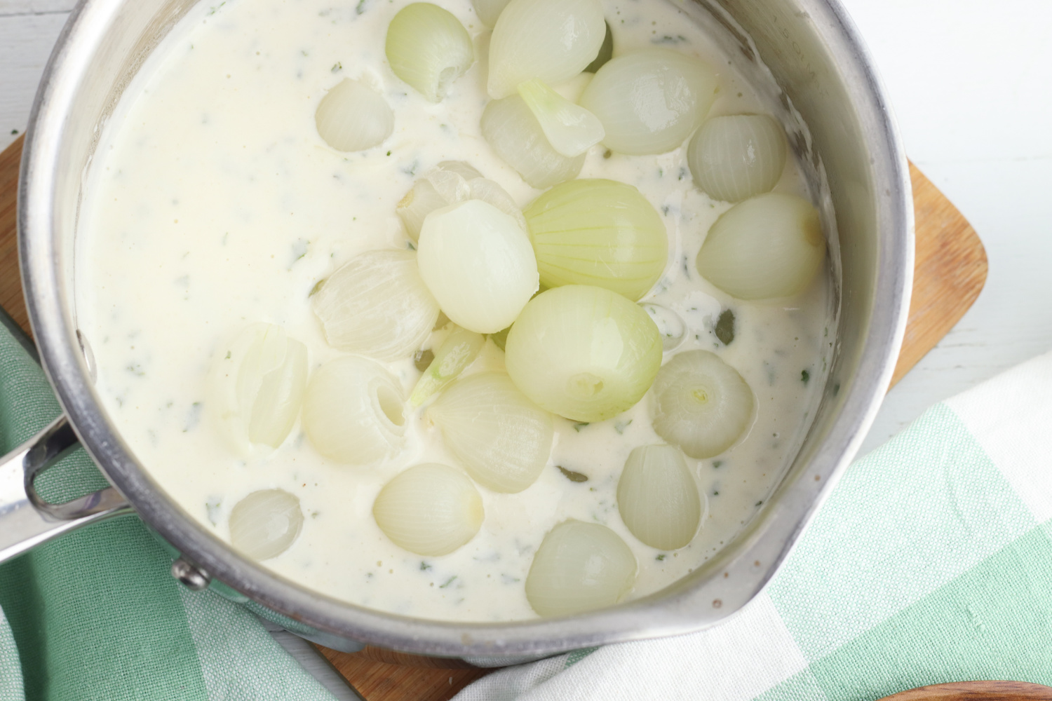 Add onions into cream sauce