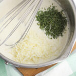 stir in parsley and parmesan cheese