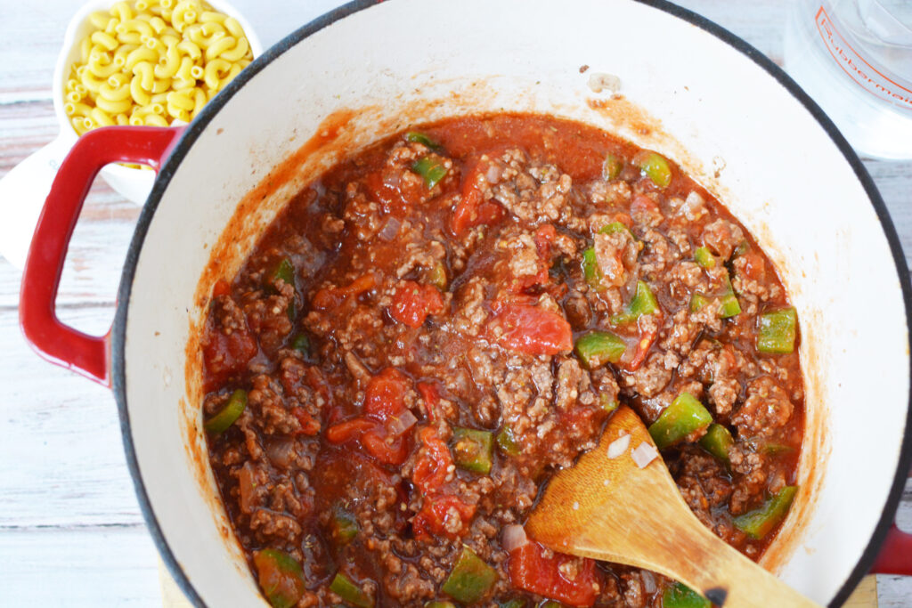 Cooking Goulash ingredients in a large stockpot. 