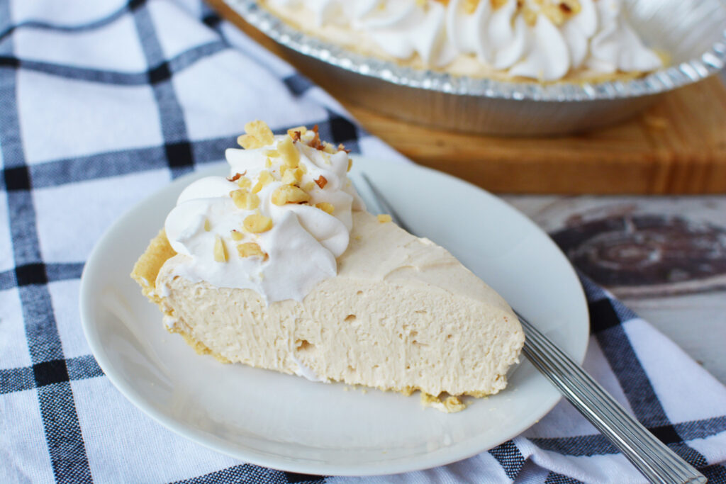 No Bake Peanut Butter Pie being served on a white plate.