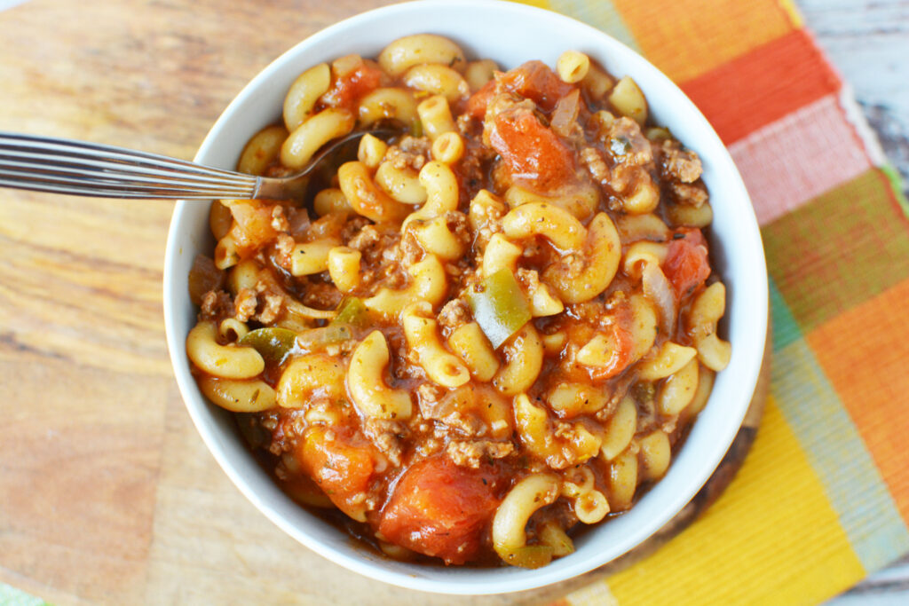 Old Fashioned Goulash being served in a white bowl.