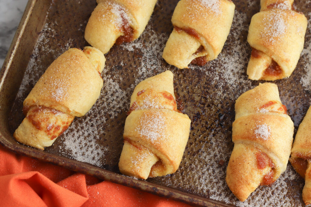 Sprinkle crescent rolls with pumpkin and sugar