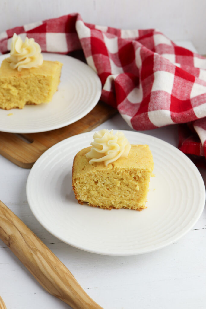 Easy Honey Butter Cornbread topped with butter. 