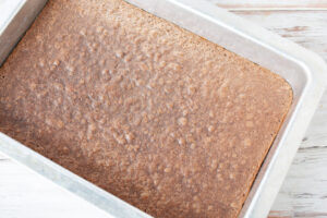 Chocolate brownies coming out of oven.