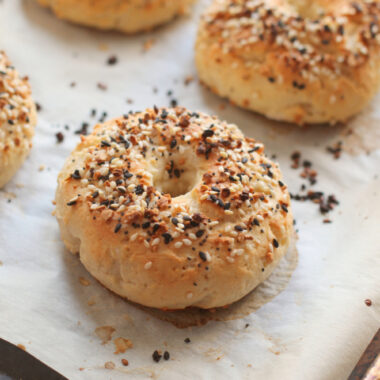 2 ingredient bagels on baking sheet.