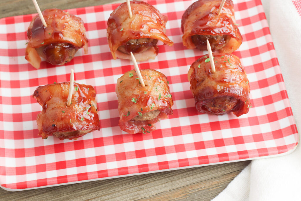 BBQ Bacon Meatballs on a checkered plate.