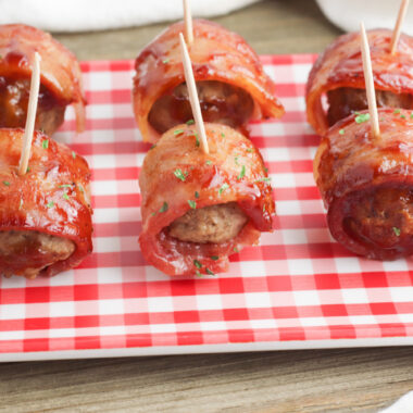 Bacon Wrapped Meatballs with toothpicks in them.