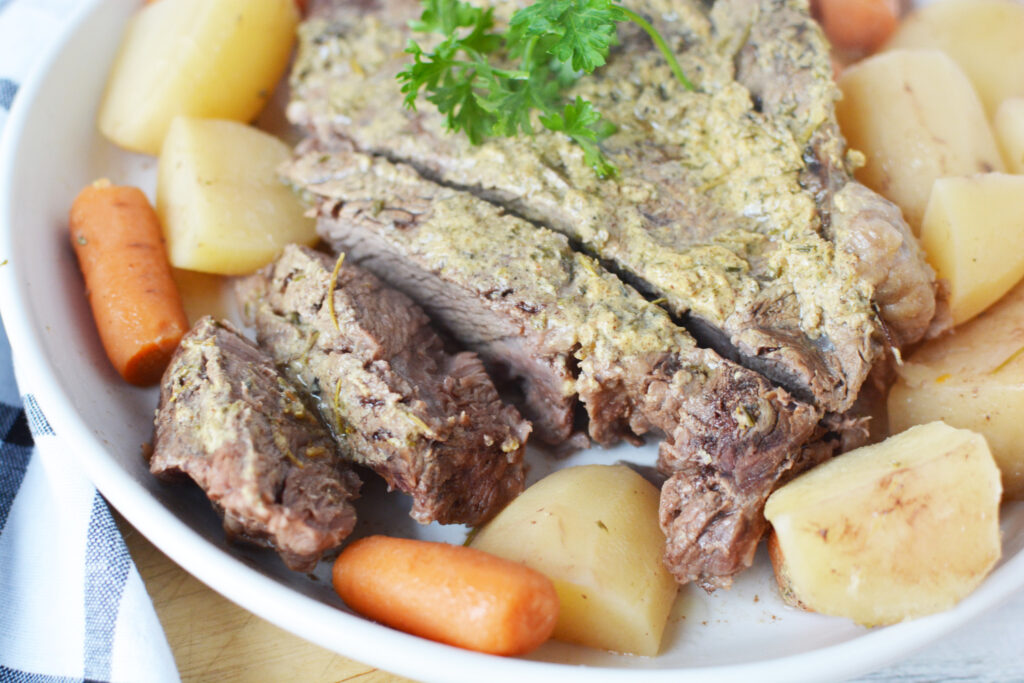 Slow Cooker Chuck Roast being served for dinner.