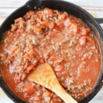 Simmer meat sauce in skillet