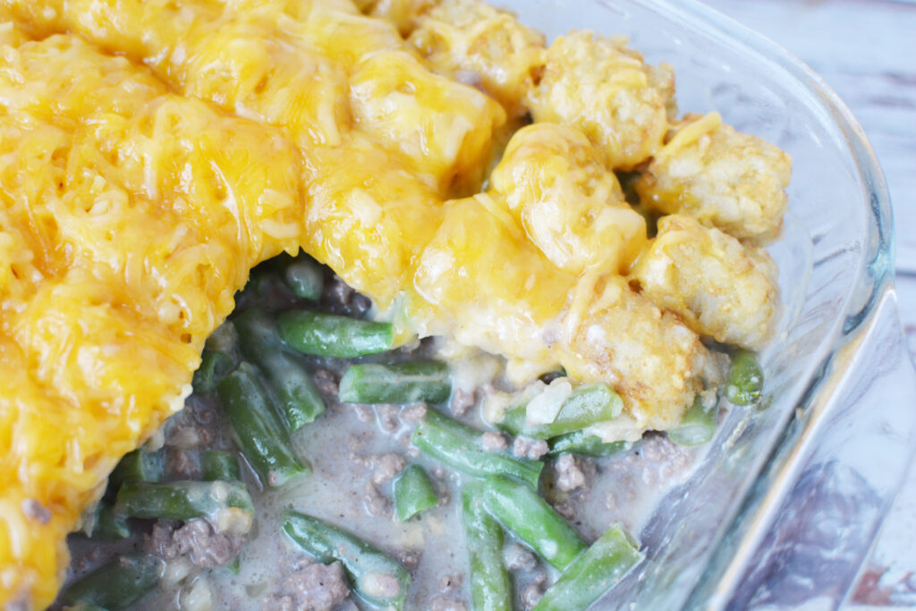 Tater Tot Hot Dish with Green Beans being served for dinner.
