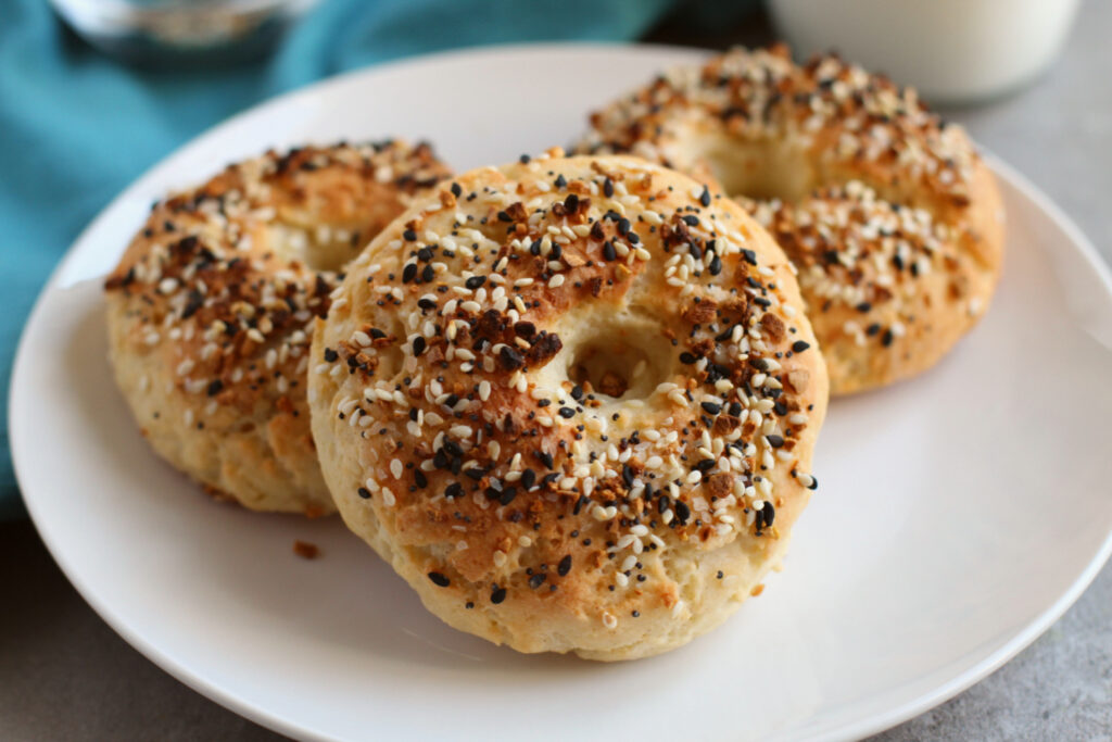 weight watchers bagels stacked on a white plate.