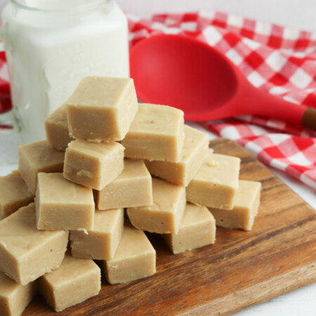 Easy Peanut Butter Fudge Recipe on a wooden cutting board