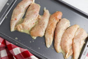 place chicken on baking sheet