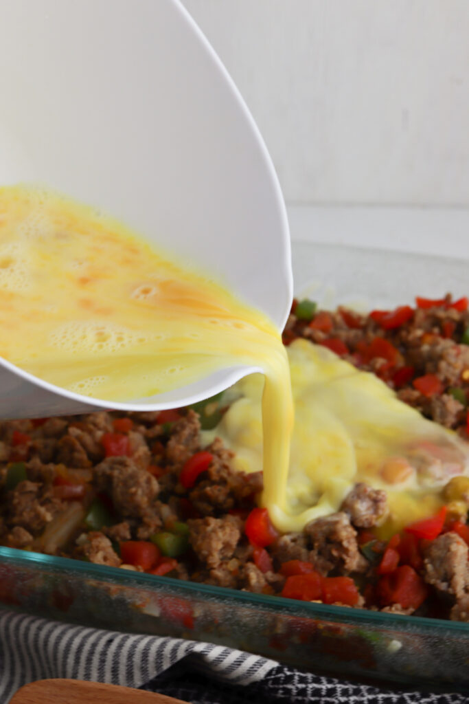 pour egg mixture over casserole