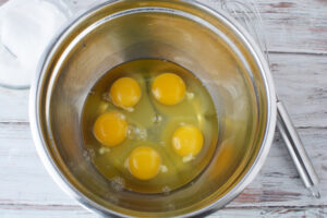 Beat Eggs in mixing bowl