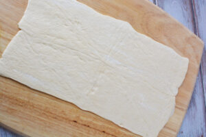 Lay dough on flat surface