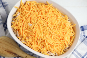 Top casserole with cheese