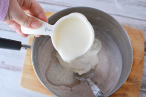 Stir in sour cream and milk