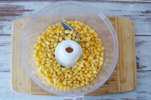 Add corn to food processor