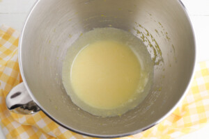 add sugar and yolks to egg whites