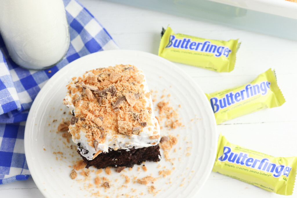 butterfinger cake on a white plate
