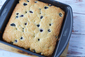 bake blueberry cake coming out of the oven.