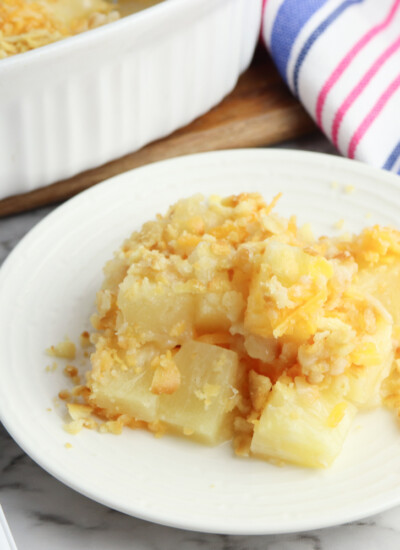 Pineapple Casserole being served on a white plate