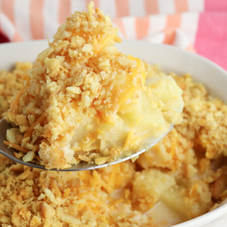 Pineapple Casserole Recipe on a serving spoon