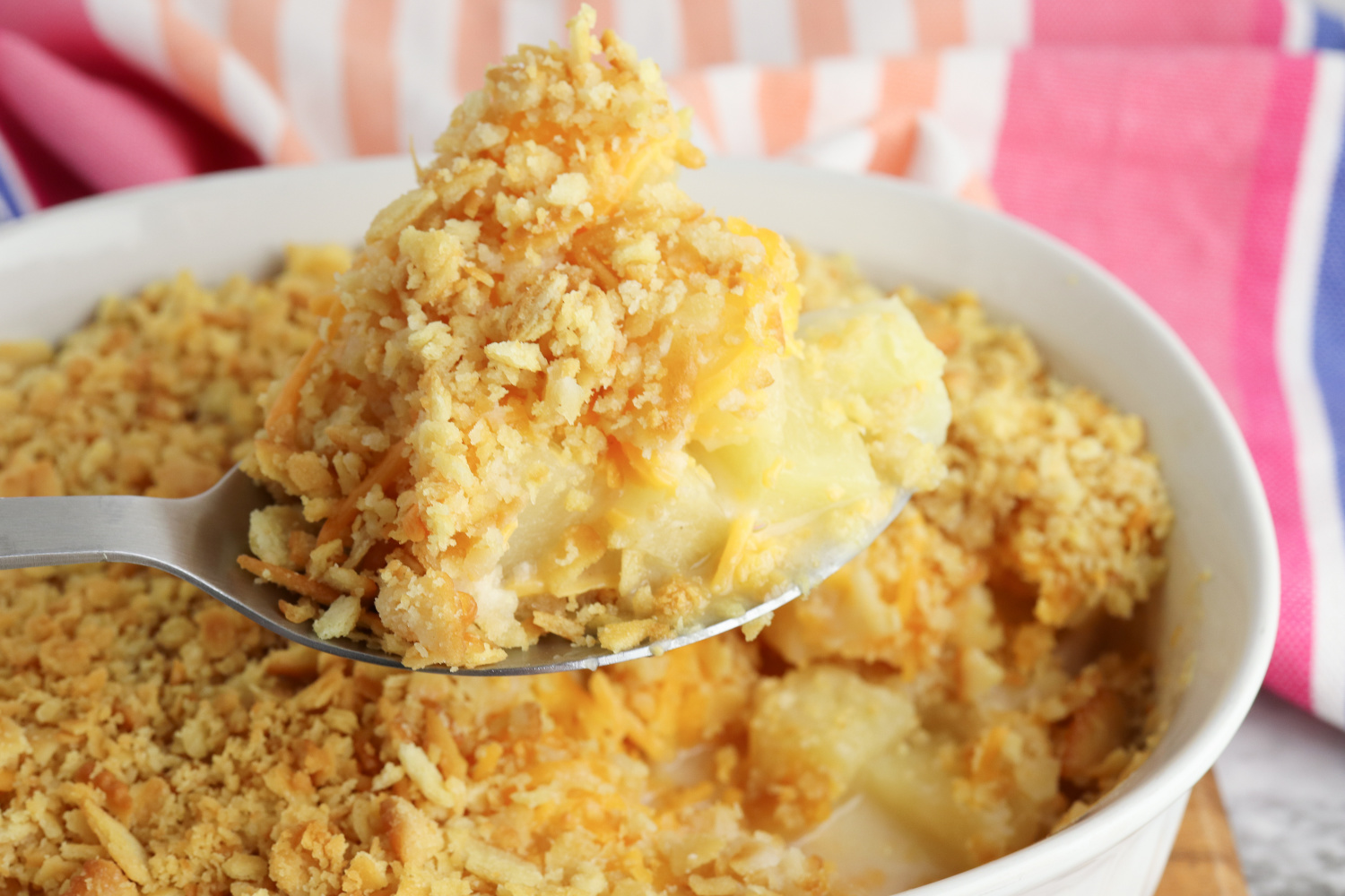 Pineapple Casserole Recipe on a serving spoon