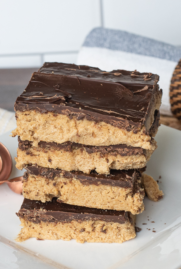 Reese's Bars stacked on a white plate