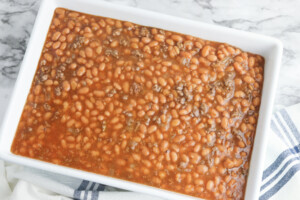 pour beans into baking dish