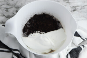 combine whipped topping and oreos