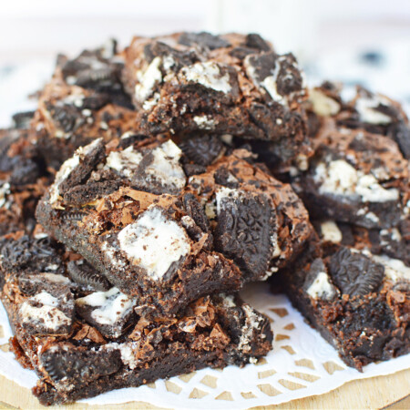 Oreo Brownies piled on a plate.