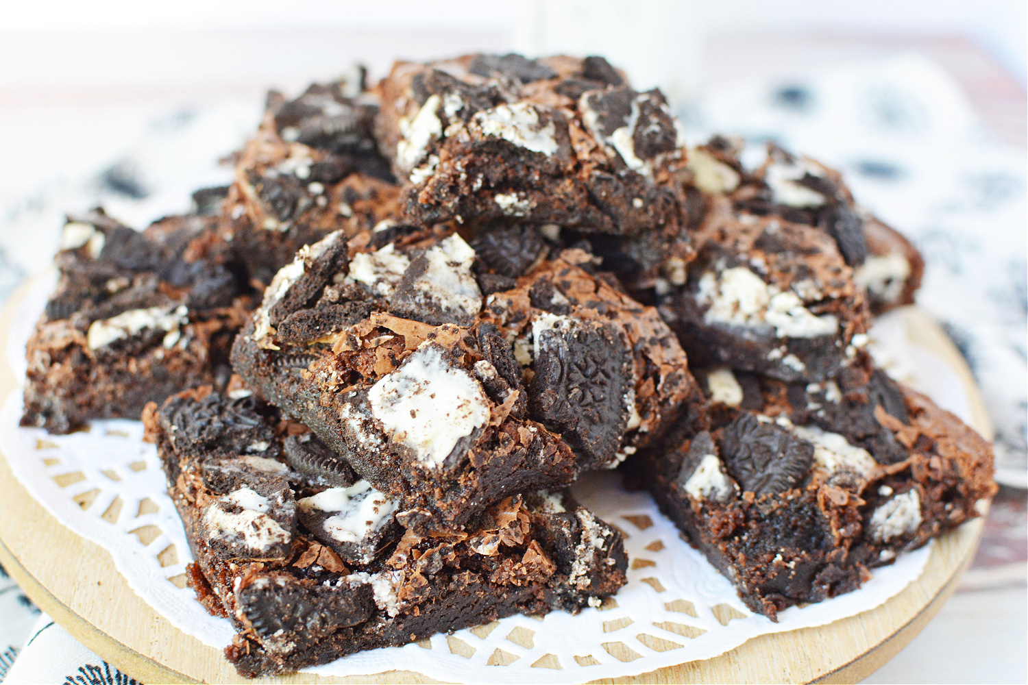 Oreo Brownies piled on a plate.