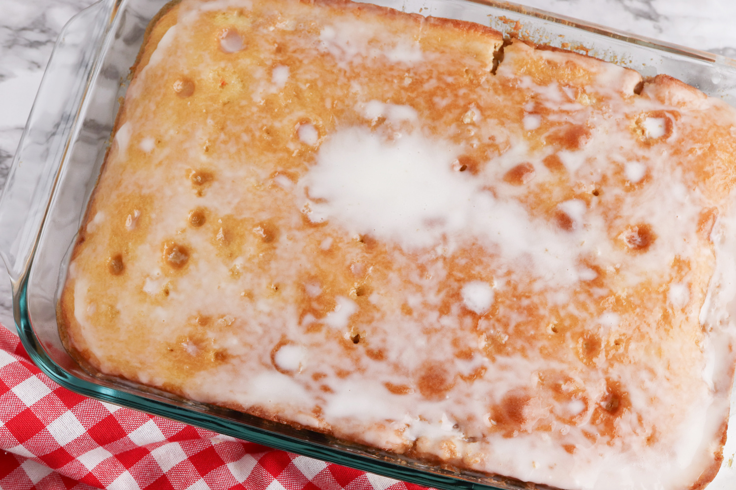 spread glaze on top of cake.