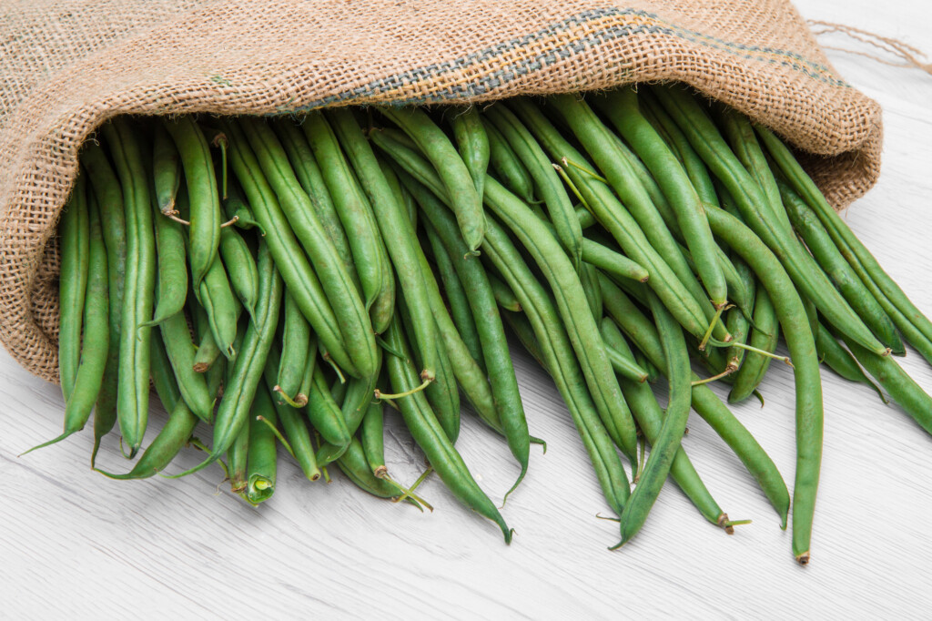 canvas sack full of green beans