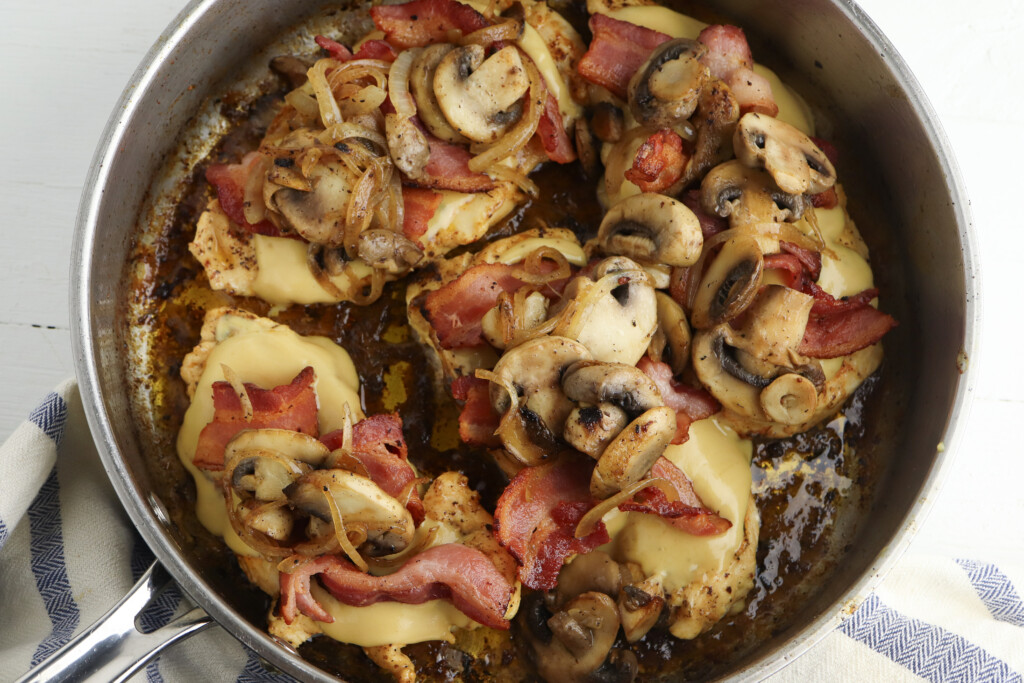 Top chicken with onions and mushrooms